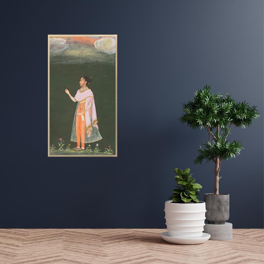 A woman at the court of bikaner holding a flower